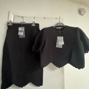 Alexander McQueen embossed skirt set black size large. Brand new